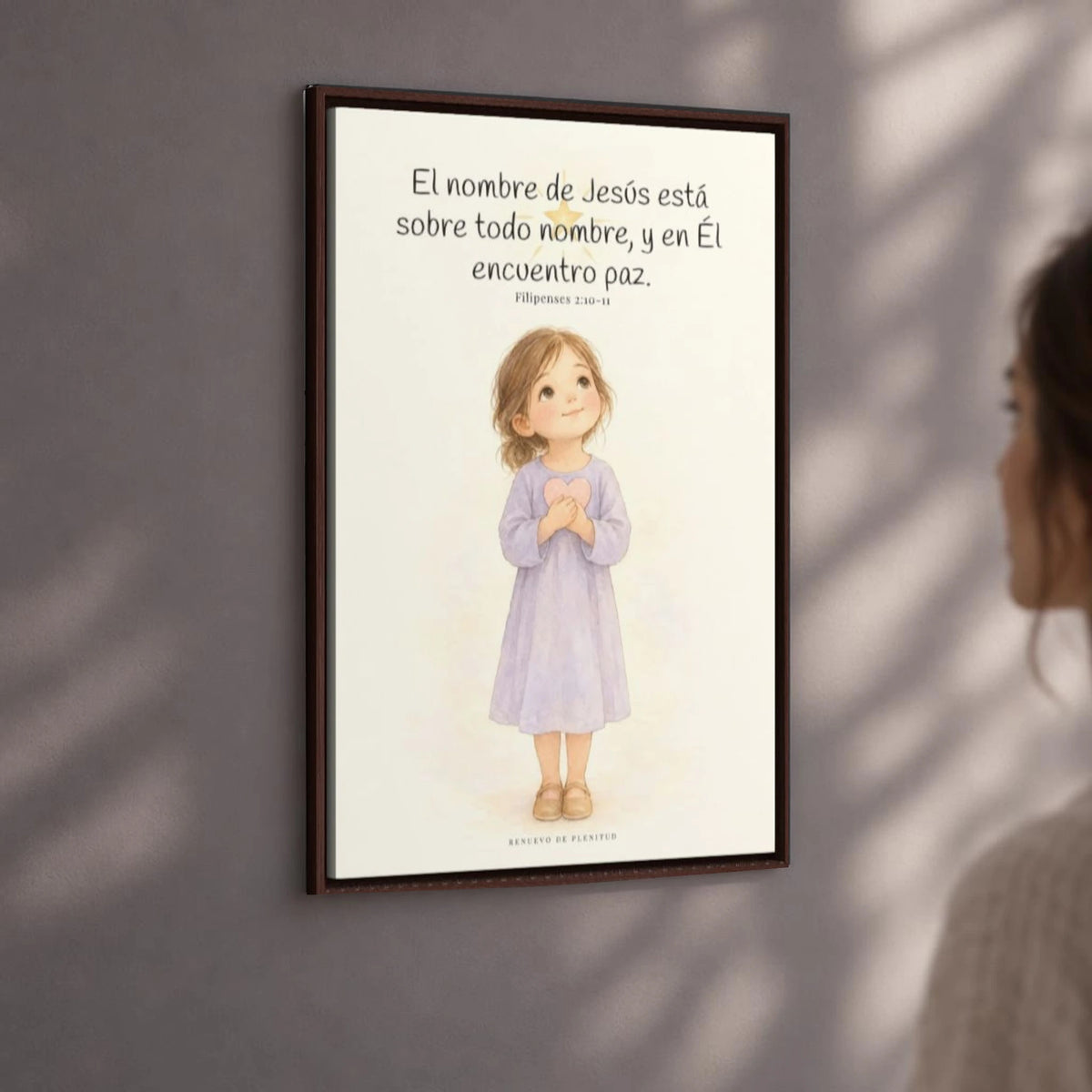 El nombre de Jesús está sobre todo nombre | Lienzo de fe para el hogar | Filipenses 2:10-11 — 24×36 pulgadas, marco espresso, vista angular ambiental del marco flotante, escala física calibrada