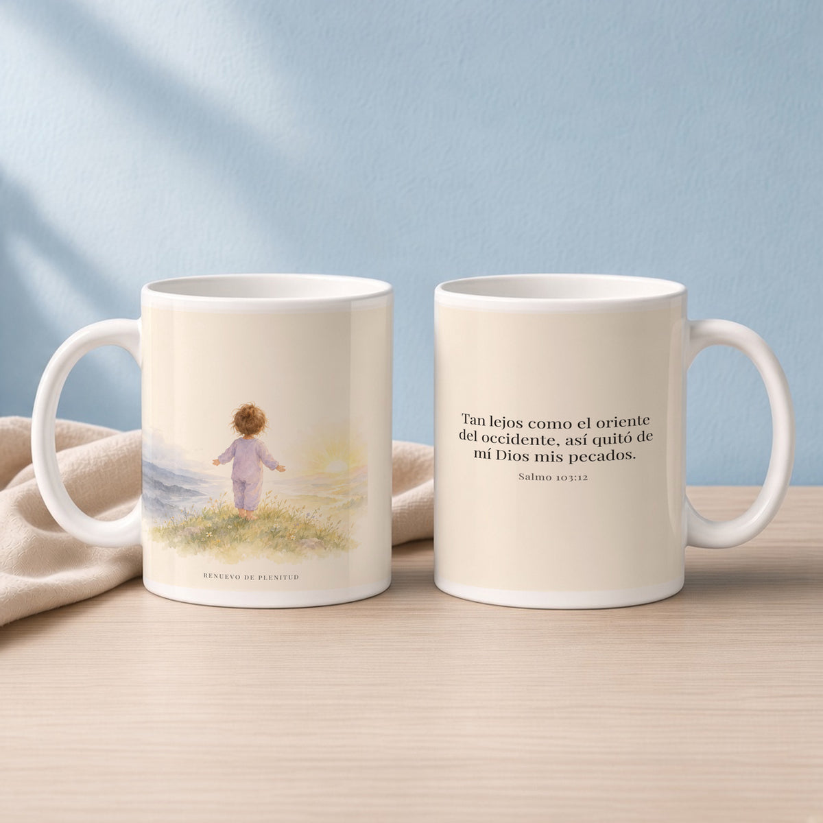 Cuan lejos está el oriente del occidente | Taza devocional ilustrada | Salmo 103:12 — 15oz · Lectura azul sereno, arte y frase devocional en dos tazas